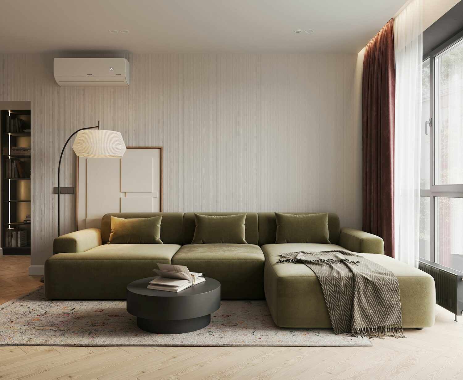 A calm, comfortable living room with a wall mounted air conditioning unit providing heating and cooling all year round